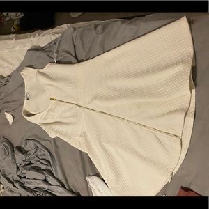 White Bebe dress with gold zipper size large